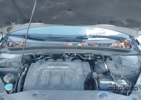 2007 Honda Odyssey Ex-L z USA, uszkodzony, nr VIN 5FNRL387X7B081408